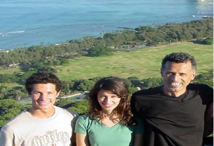 Alan Dibartolomeo with 2 of his kids with Waikiki in back